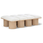 Meridian Furniture - Pavilion Black Boucle Fabric Bench, Cream, Natural Finish, 62" W X 36" D X 17.5" H - Bring valuable seating and remarkable style to your space with this cream Pavilion boucle fabric bench, an exquisite balance of style and usability for the entryway, bedroom, and beyond. Crafted from oak veneer with a natural finish, this bench has a 4-inch-thick seat cushion that's channel-tufted for a touch of luxury. The bench's columnar bases add a dash of art deco design, making it a captivating focal point in any room.