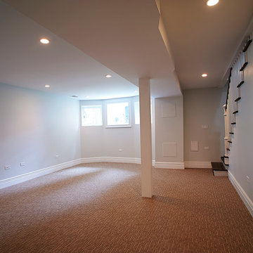 Bright Finished Basement with Carpet Flooring and Recessed Lighting