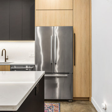 Sophisticated matte black and warm rift cut oak collision