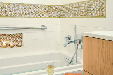 Example of a mid-sized trendy master white tile and subway tile porcelain tile alcove bathtub design in San Diego with flat-panel cabinets, quartz countertops, yellow walls and medium tone wood cabinets