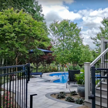 Pool Oasis with Hardscaping Features