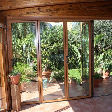 Chiusura portico con vetrate impacchettabili in alluminio