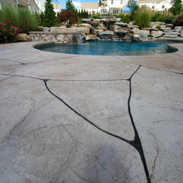 Freeform Style Pool with Waterfall and Fire Pit
