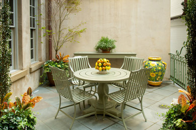 Trendy tile patio photo in Charleston