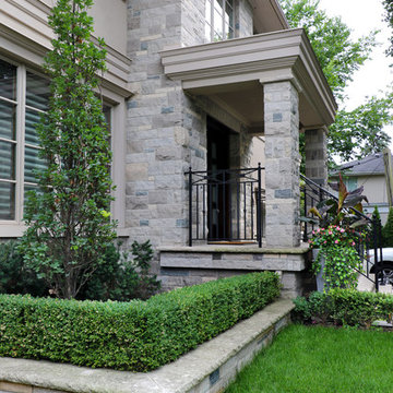 Warm and welcoming front flagstone and terrace
