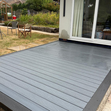 Slate Grey Composite Deck Off a Patio Door