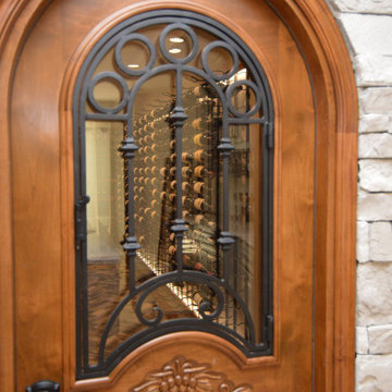 Wine Cellar Door Made with Wood, Glass, and Wrought Iron