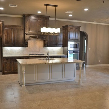 Open Transitional Kitchen with Stained Knotty Alder Cabinets