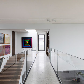 Second-floor hallway highlights the home's open-concept design