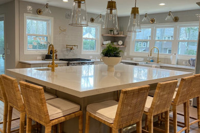 This is an example of a large transitional kitchen in New York.