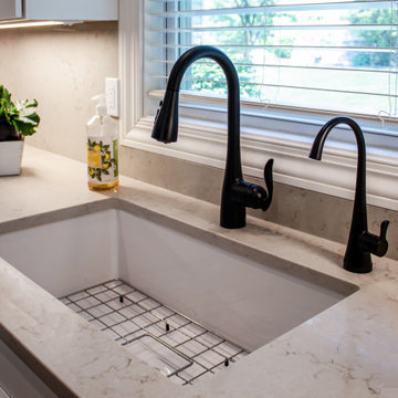 White Kitchen with Black Range Hood and Taj Royale quartz Countertops