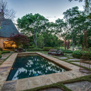 One-of-a-kind estate overlooks serene lake on just under an acre!