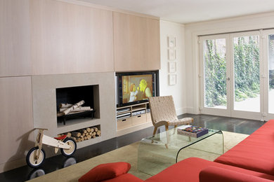 Modern living room in Boston with a standard fireplace and a built-in media wall.