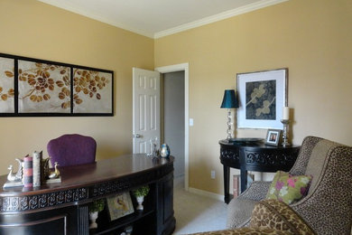 Study room - large traditional freestanding desk carpeted study room idea in Other with beige walls