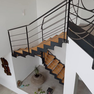 Maison à étage moderne avec vide sur séjour et grande verriére