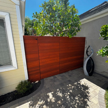 Stained Wood Gate/Fence with Water Feature