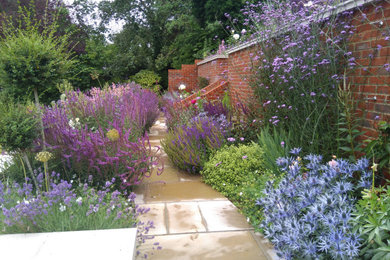 Inspiration for a traditional garden in Surrey.