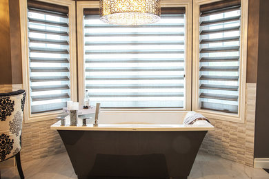 Inspiration for a mid-sized contemporary master bathroom remodel in Other with shaker cabinets, a one-piece toilet, brown walls, an undermount sink and a hinged shower door