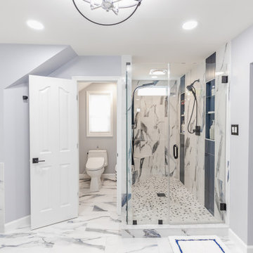 Bathroom remodeling in Columbia, MD with double vanity & marble bathtub