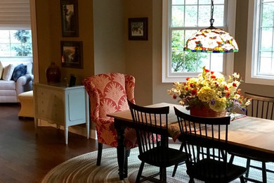 Eat-in kitchen - large country l-shaped eat-in kitchen idea in Raleigh with white cabinets and an island