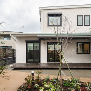 他の地域のコンテンポラリースタイルのおしゃれなデッキ (日よけなし) の写真