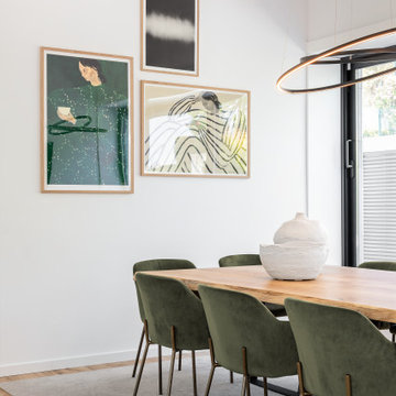 Quinta dos Alcoutins dining room with green chairs and garden view