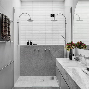 Design ideas for a contemporary bathroom in Melbourne with shaker cabinets, grey cabinets, a double shower, gray tile, white tile, an undermount sink, grey floor, a hinged shower door and grey benchtops.