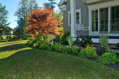 Inspiration for a timeless gray two-story vinyl exterior home remodel in Boston