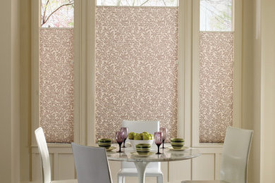Example of a mid-sized transitional dark wood floor kitchen/dining room combo design in New York with beige walls and no fireplace