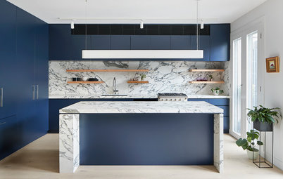 Room of the Week: Deep Blue and Veined Marble Forge a Wow Kitchen