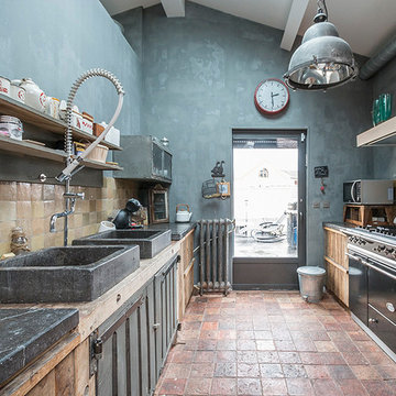 Transformation d'un bâtiment industriel en loft et maison familiale