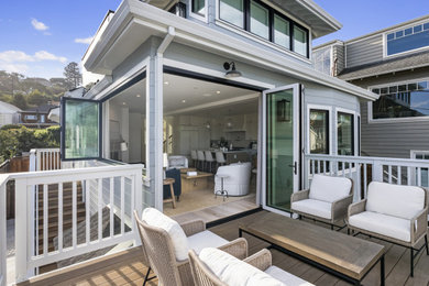 Balcony - large coastal wood railing balcony idea in San Francisco with no cover