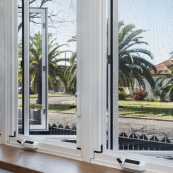 White Casement Windows above a bench - Windows