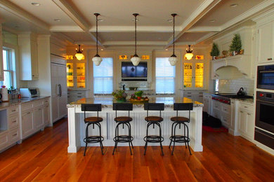 Example of a transitional kitchen design in New York
