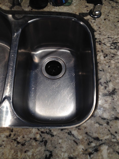 Scratched Kitchen sink... replace? or rebuff (even if possible)?