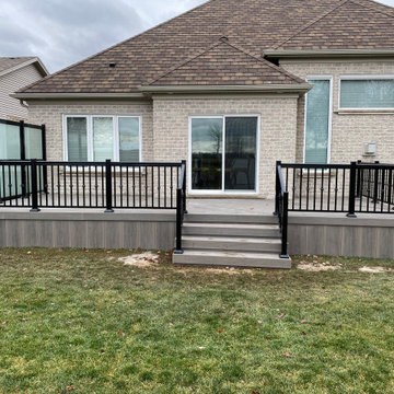 Clubhouse PVC Deck with Aluminum Railings & Frosted Glass Privacy Screen
