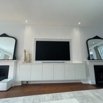 Floating TV unit with slatted panel