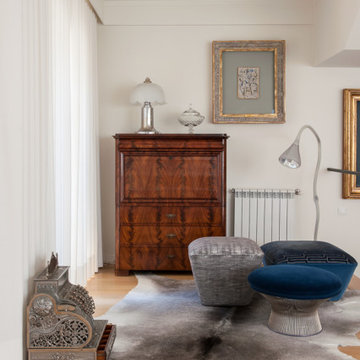 Wooden Chest and Artwork beside the Staircase