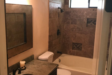 Example of a tuscan bathroom design in Orange County