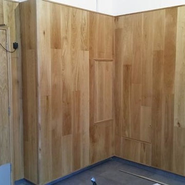 Installing Wall Cladding and Concrete Floor Tiles in Hide Tower