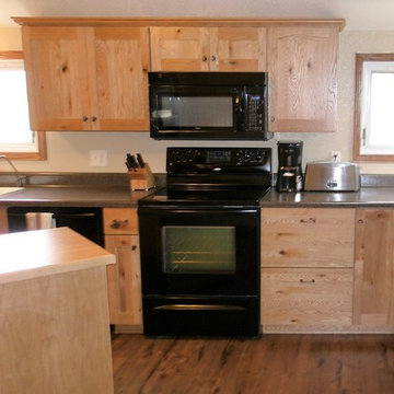 Omega Cabinetry. Monterey door, Pecan wood, Natural finish.