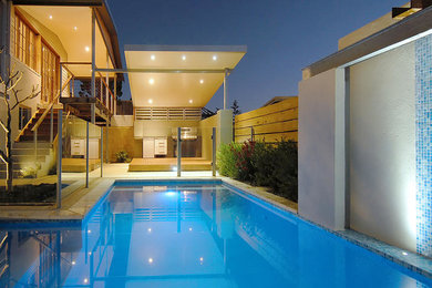 Photo of a mid-sized modern backyard pool in Perth.