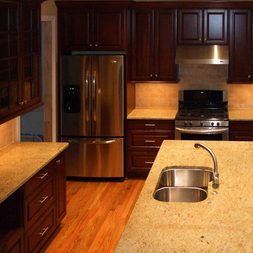 Contemporary Remodeled Kitchen with Deep Cherry Cabinets & Contrasting Island