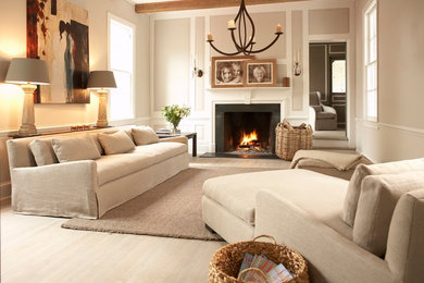 Living room - large transitional enclosed light wood floor living room idea in Sacramento with gray walls, a standard fireplace and a stone fireplace