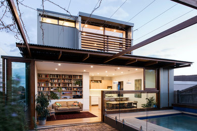 Mid-sized contemporary open concept family room in Sydney.