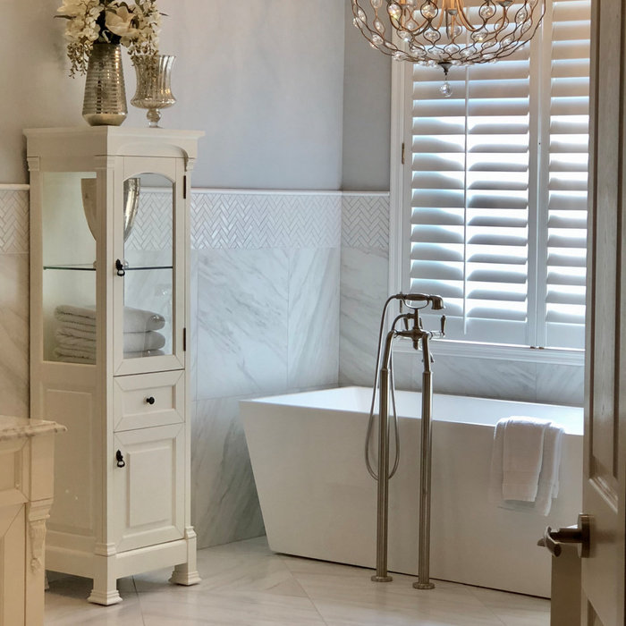Mid-sized transitional master white tile and marble tile marble floor and gray floor bathroom photo in Orlando with white cabinets, a two-piece toilet, gray walls, an undermount sink and a hinged show