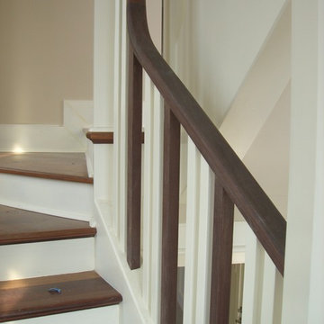 curved stairs and unique bannister