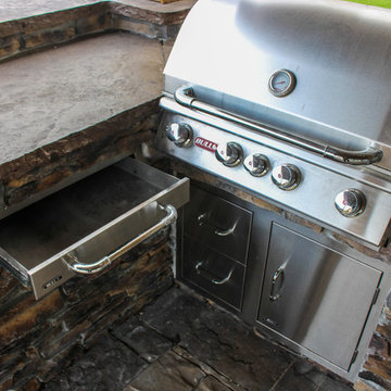 Pull Out Drawer and Stone Counter Tops on Stainless Steel Kitchen Set