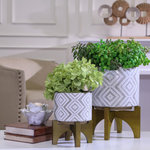 Sagebrook Home - Sagebrook Home White/Gray Planter On Stand 6.75" - Sagebrook Home White/Gray Planter On Stand 6.75" is the perfect home decor accessory to accent any corner, entryway or table in your living room, bedroom, and office.This Planter will be the perfect addition to your home decor and complement any of your existing furniture. Created from the highest quality, this Planter home accent will be a great centerpiece for your home! Sagebrook Home has been formed from a love of design, a commitment to service and a dedication to quality. They create and import fashion forward items in the most popular design styles. Backed with years of experience in the textile field, they are now providing a complete home decor story. The combination of wall decor, furniture, lighting and home accessories are all coordinated with textiles to provide a complete home look. Sagebrook Home is committed to providing the best home decor and accent pieces at value prices.