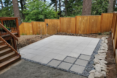 Patio - mid-sized modern backyard brick patio idea in Portland